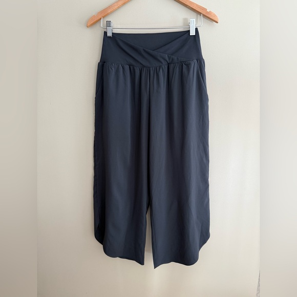 HALARA Black Cropped Pants with an Asymmetrical Bottom and Crisscross Front - Picture 10 of 17